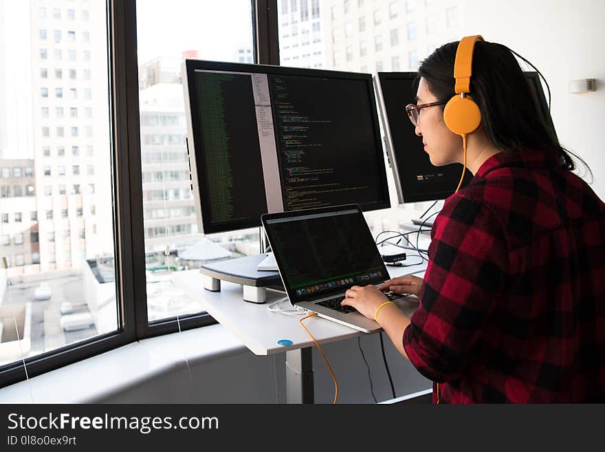 Woman Sitting in Front Laptop