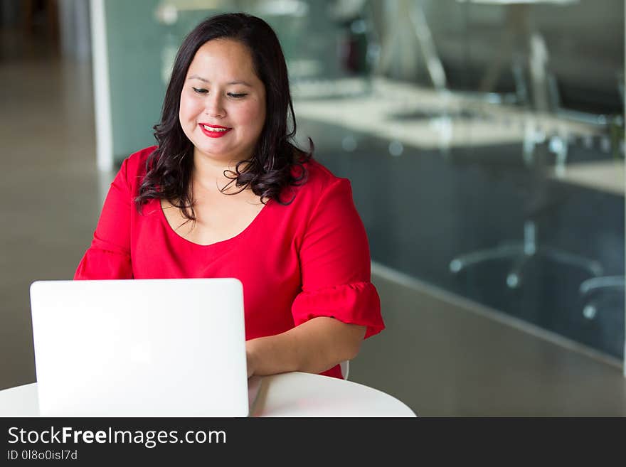 Photography of Woman Using Laptop