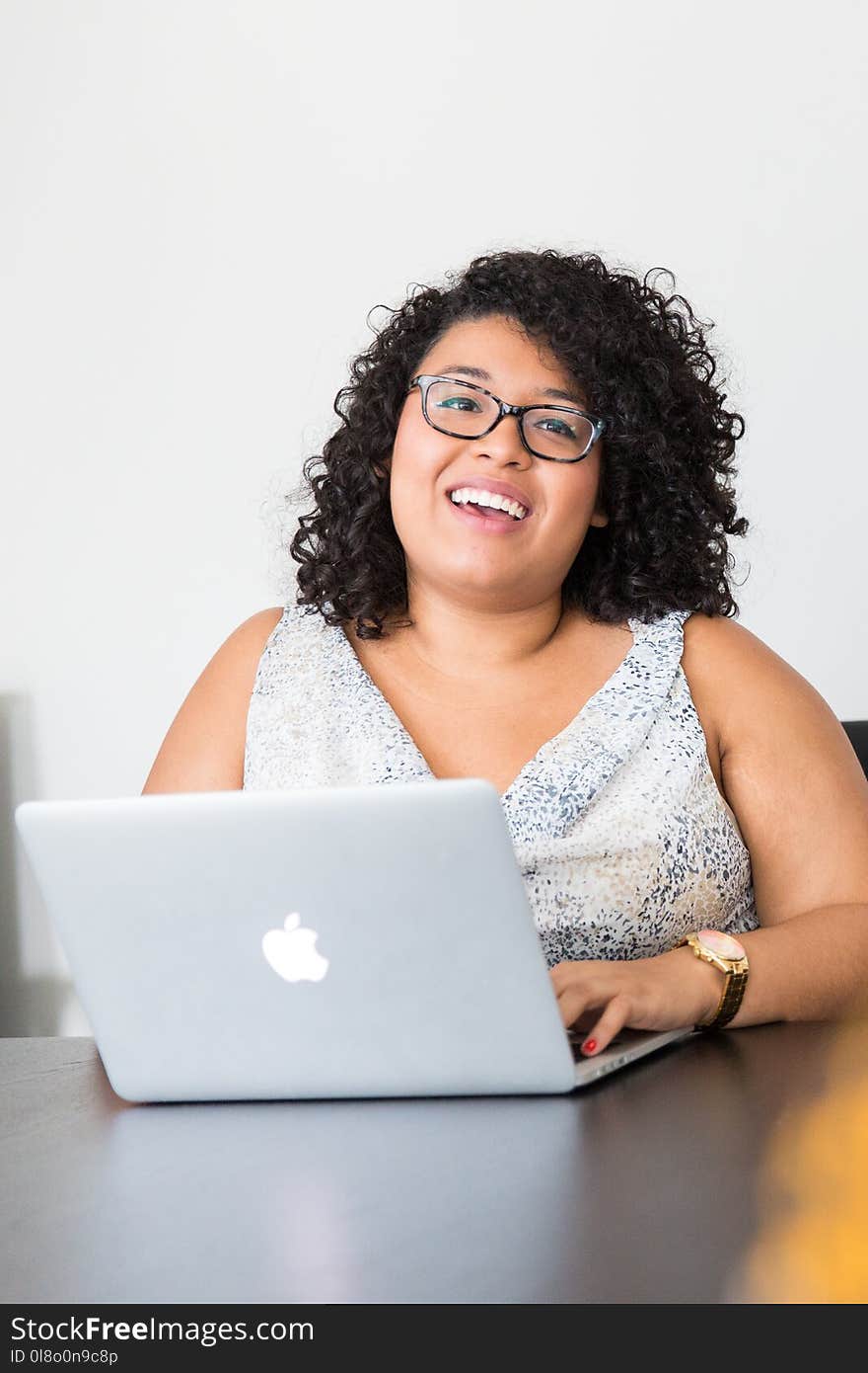 Photography of Woman Using Laptop