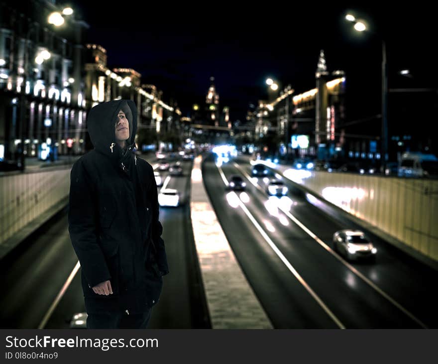 Man Wearing Black Hoodie With Road Background