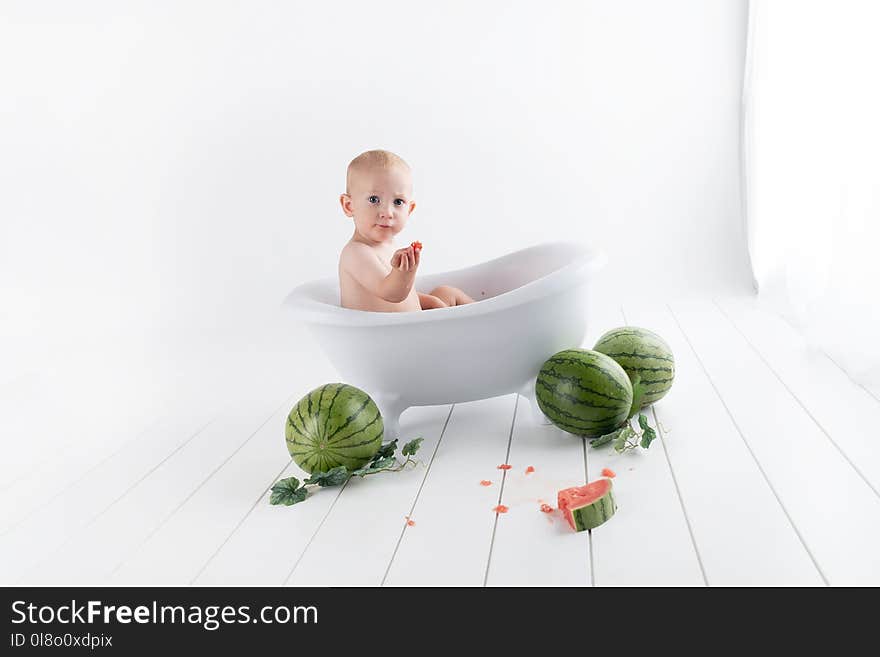 Baby In Bathtub