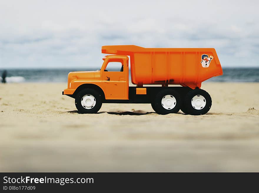 Photo of Orange Dump Truck Toy