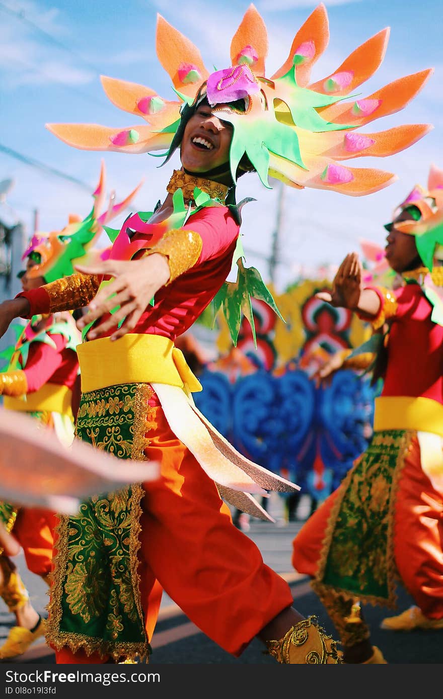 Shallow Focus Photography of Person Wearing Multicolored Costume