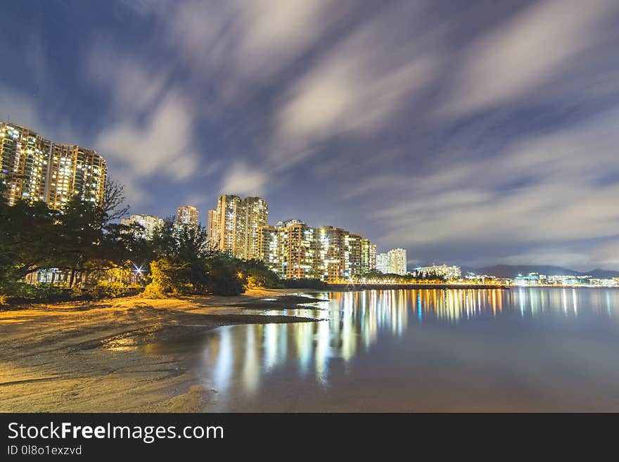 Photo of Cityscape View Near Body of Water