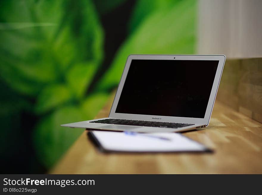 Selective Focus Photo of Macbook Air