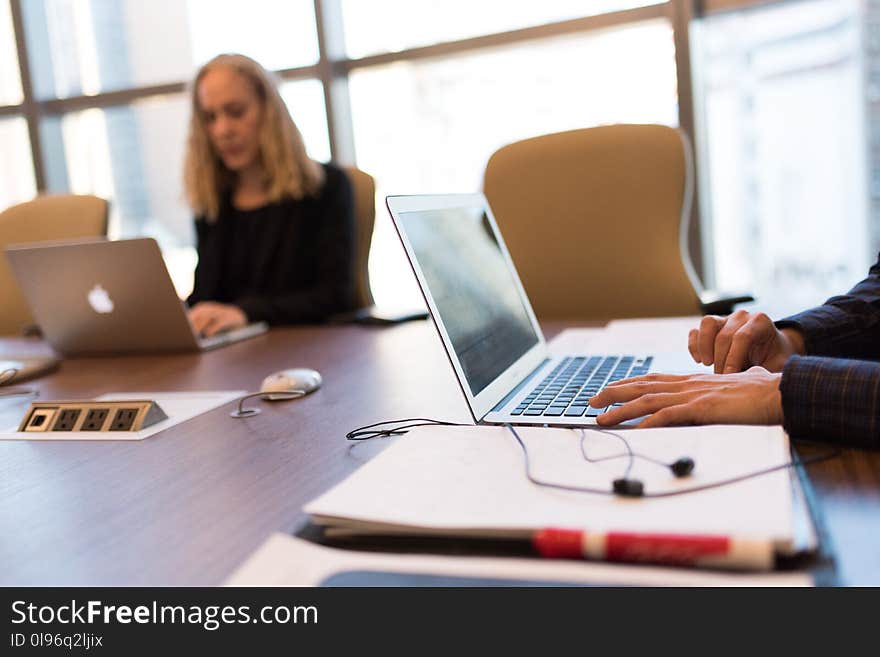 Person Touching Gray Laptop Computer