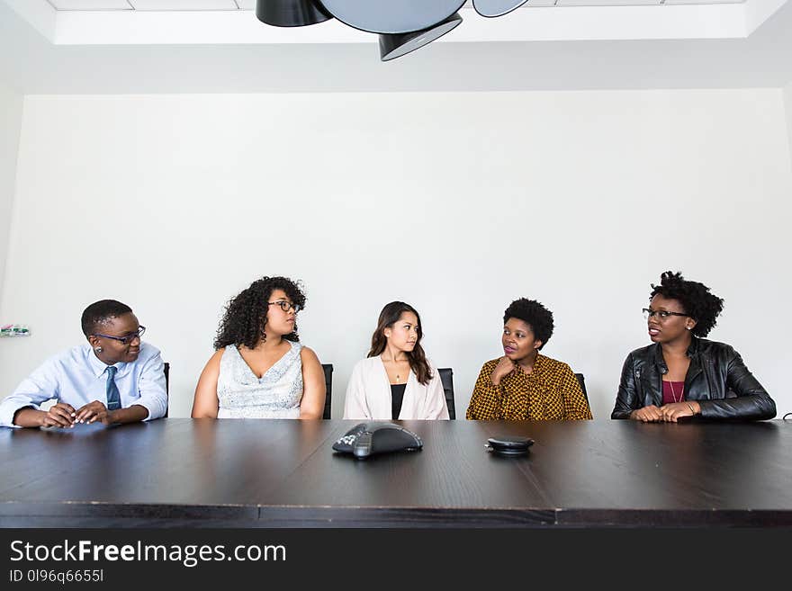 Five People Having Conversation