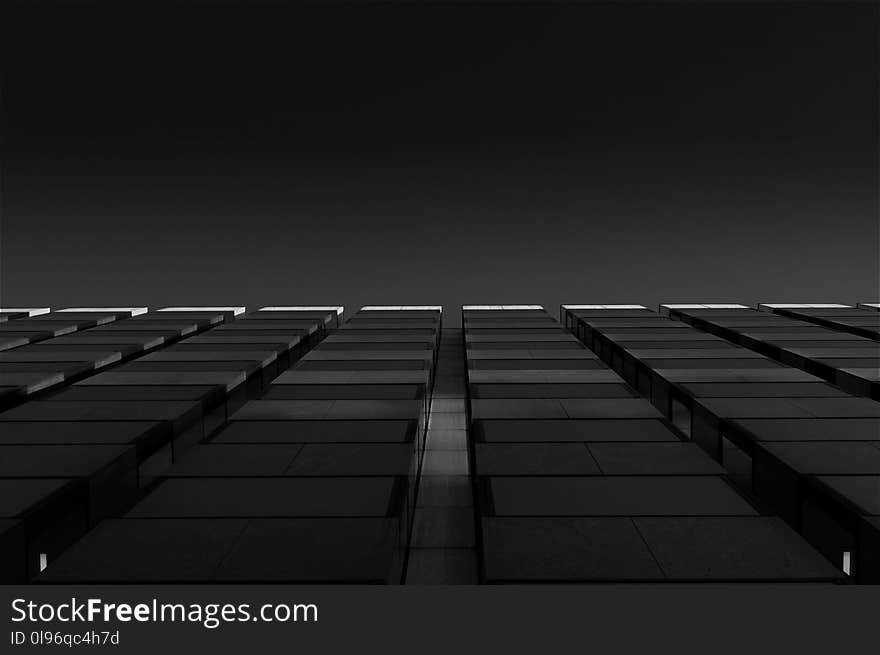 Grayscale Photo of High Rise Building