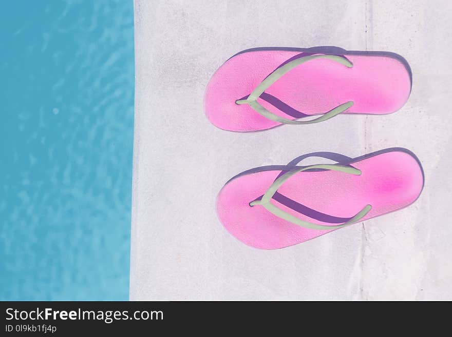 Flip Flops On Stone Background On Poolside. Summer Family Vacation Concept