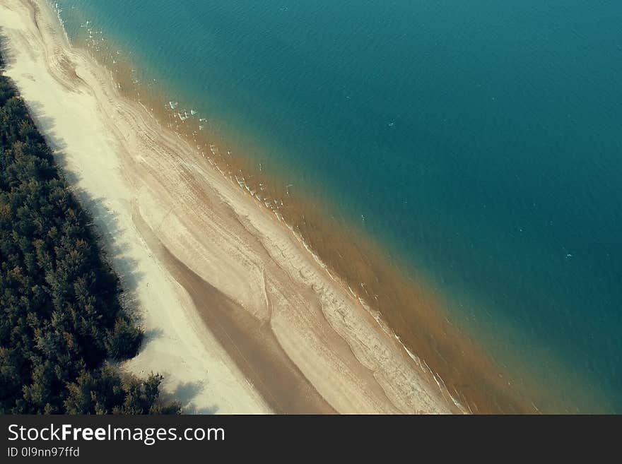 Bird&#x27;s-eye View of Coastline and Sea