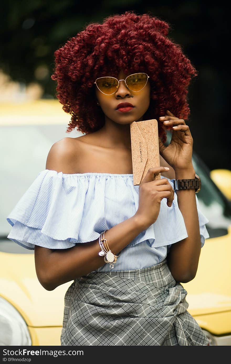 Woman Wearing Gray Off-shoulder Shirt and Sunglasses