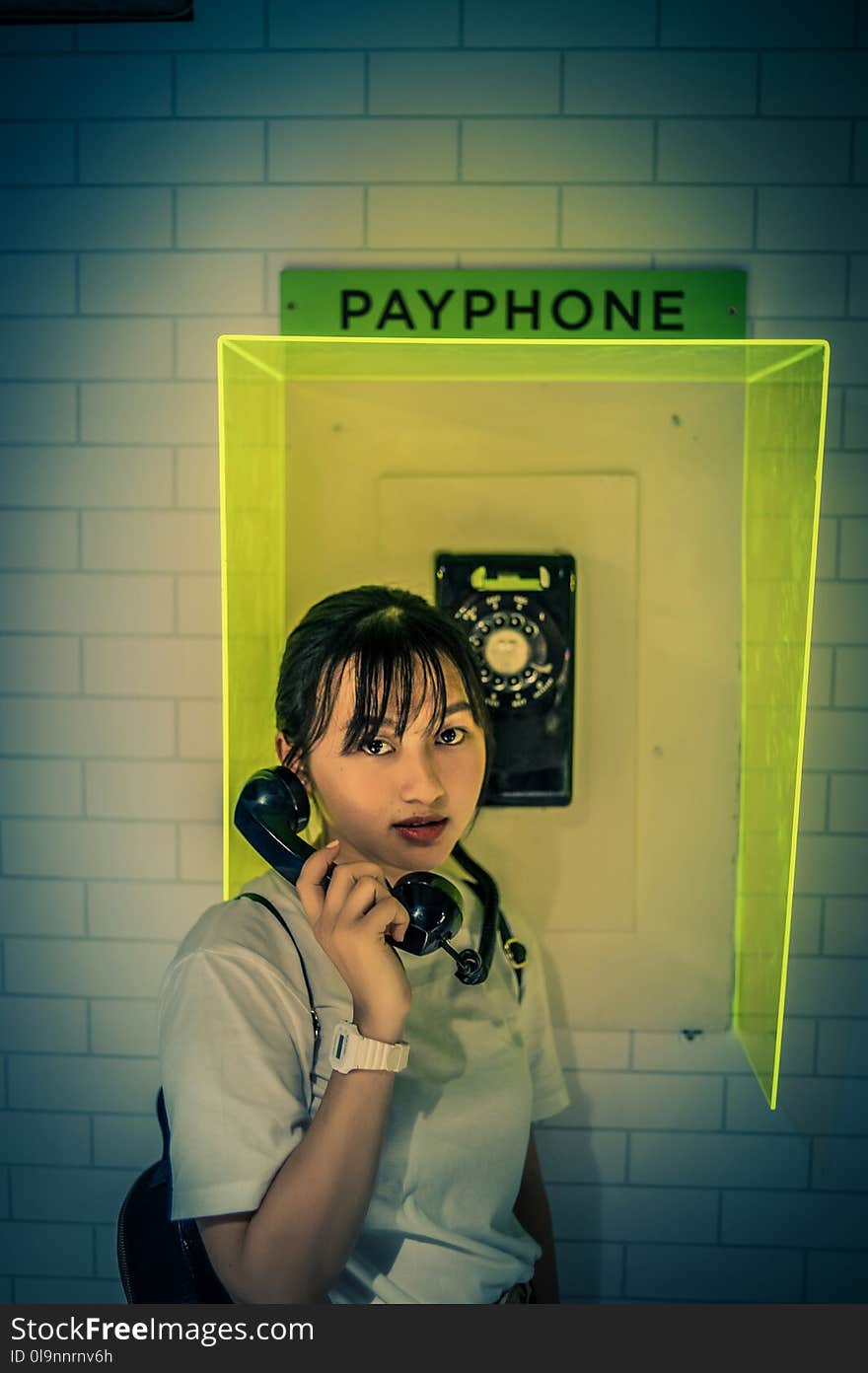 Woman at the Payphone