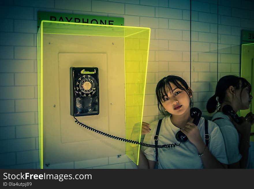 Woman Holding Rotary Telephone