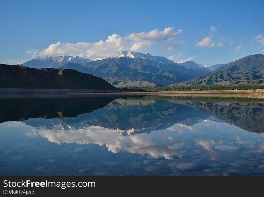 Reflective Photography of Mountain