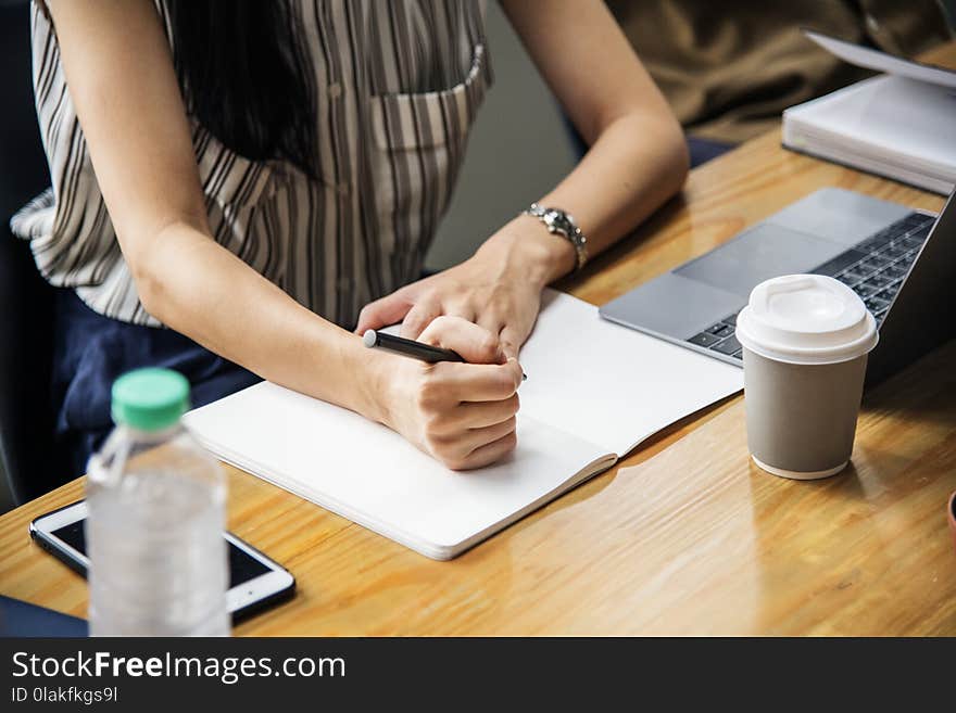 Woman Holding Pen With White Printer Paper