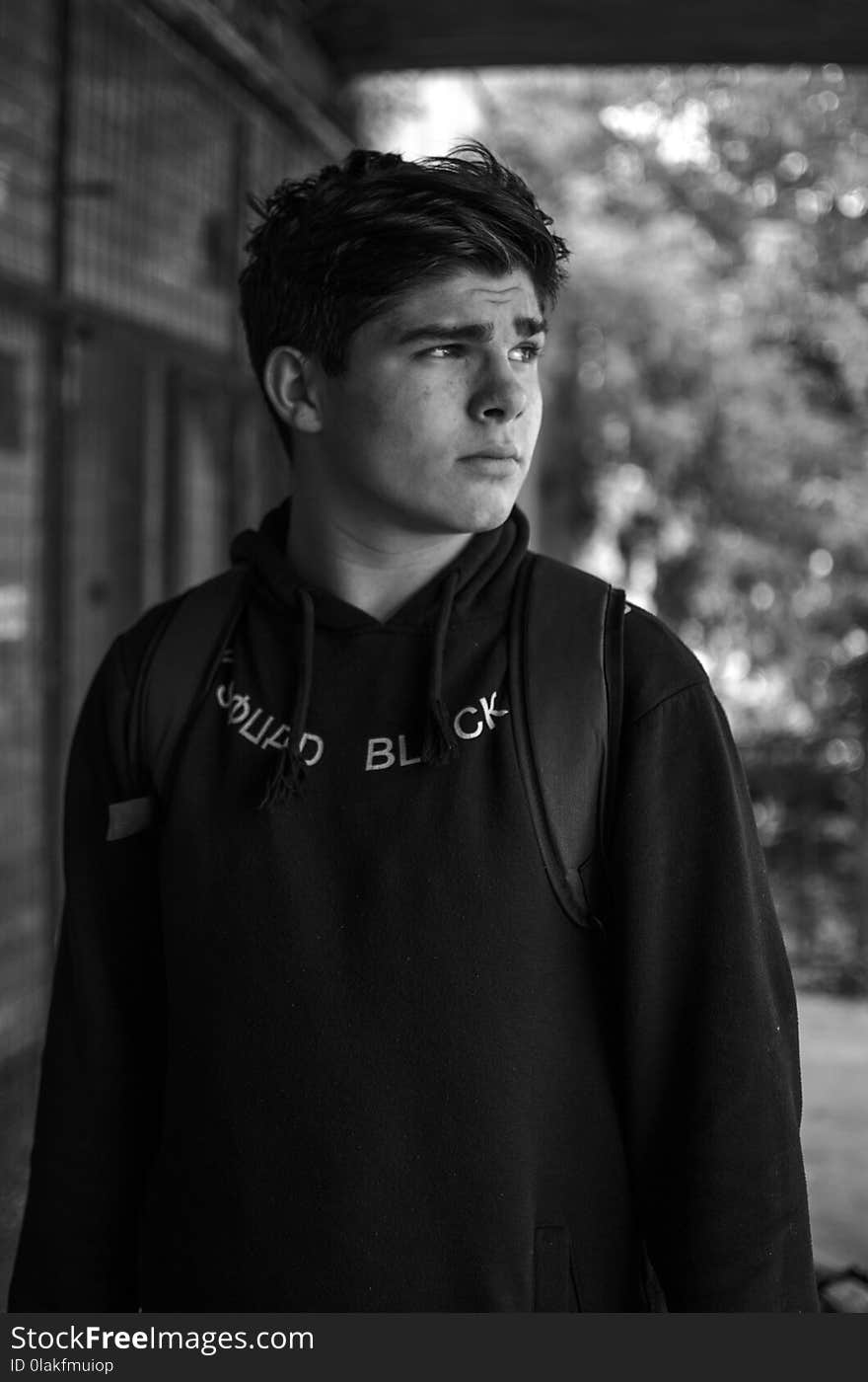 Man Wearing Hoodie Grayscale Photo