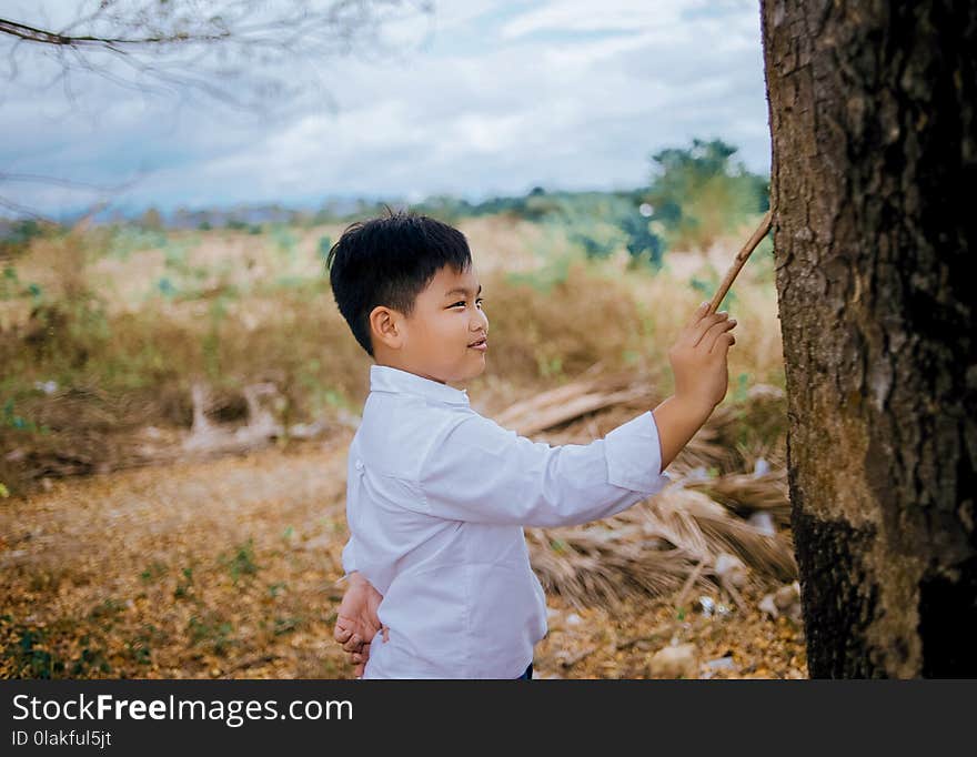 Boy in White Shirt