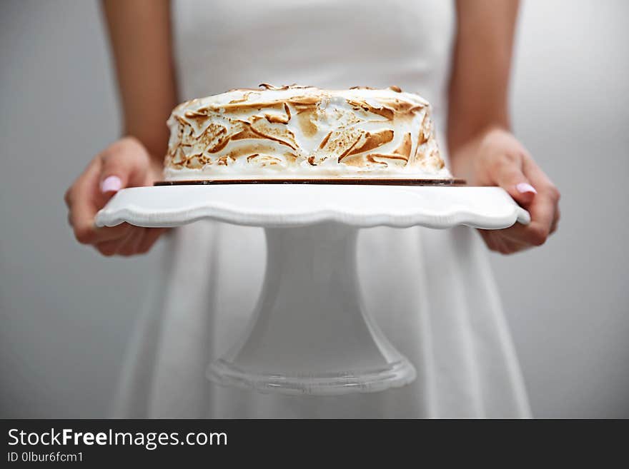 Woman holding birthday cake