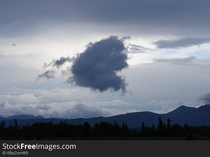 A strange cloud, a harbinger of bad weather, in The Eastern Sayans