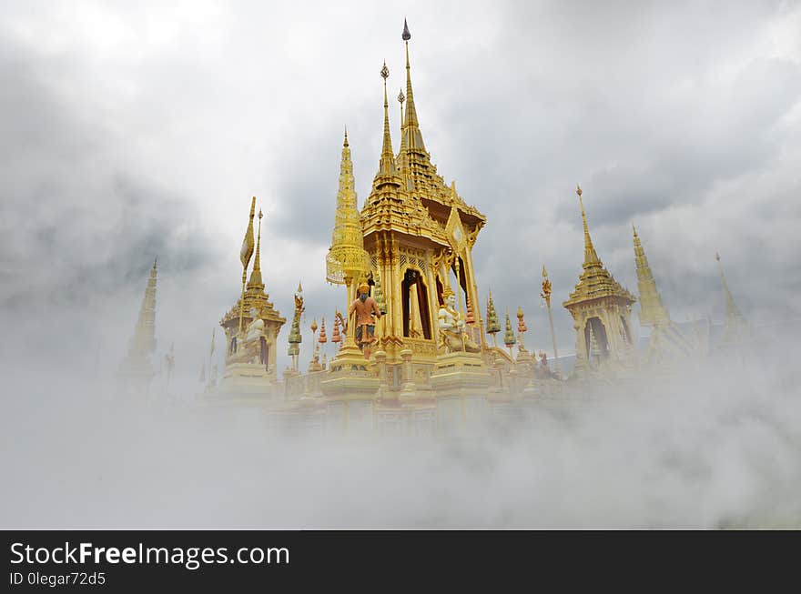 Beautiful golden royal crematorium of beloved Thai king in the clouds on the heaven