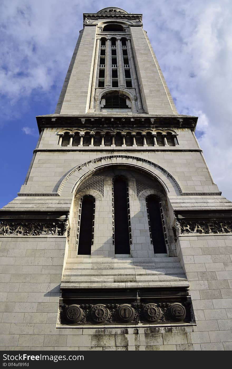 Majestic Bell Tower with Gothic Architectural Details. Sacre Coeur, Montmatre Paris France.