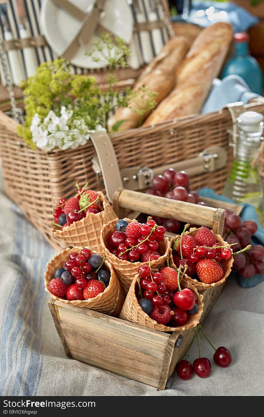 Selection Of Fresh Berries Displayed In Cornets