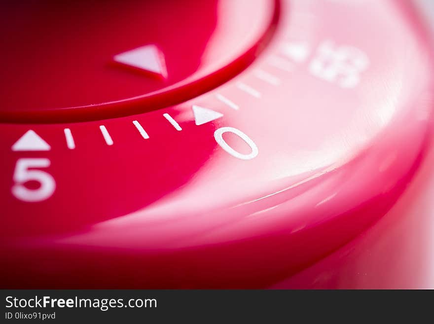 0 Minutes - 1 Hour - A Macro Of A Flat Red Kitchen Egg Timer