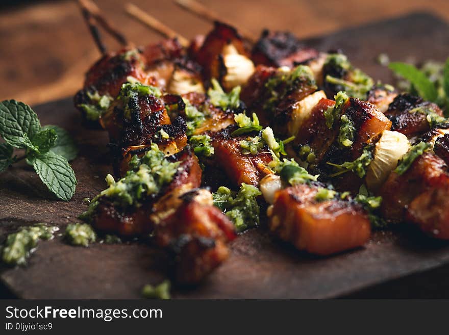 Roasted pork onion skewer barbecue on Chopping board-