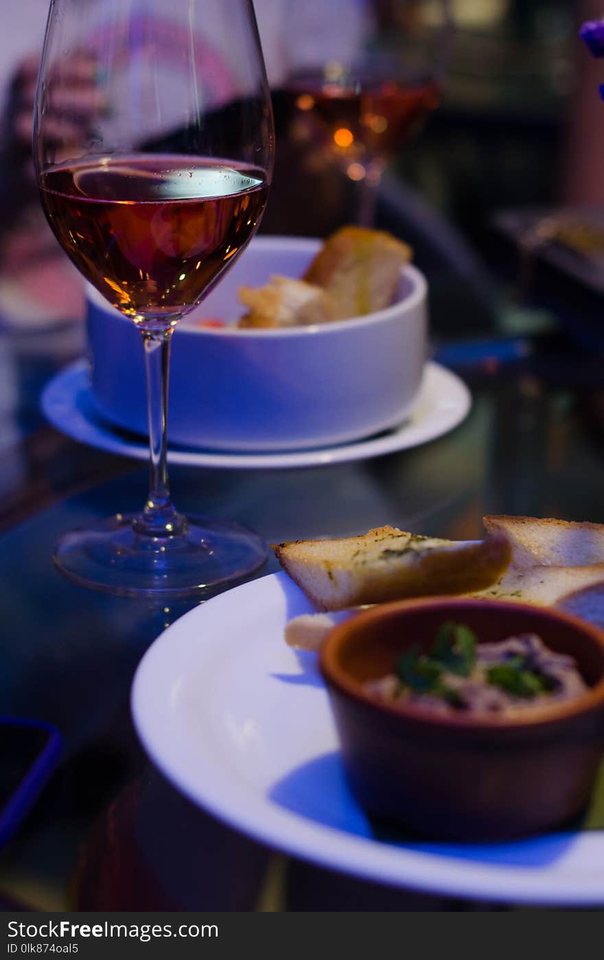 Beautiful glass of wine restaurant interior serving dinner