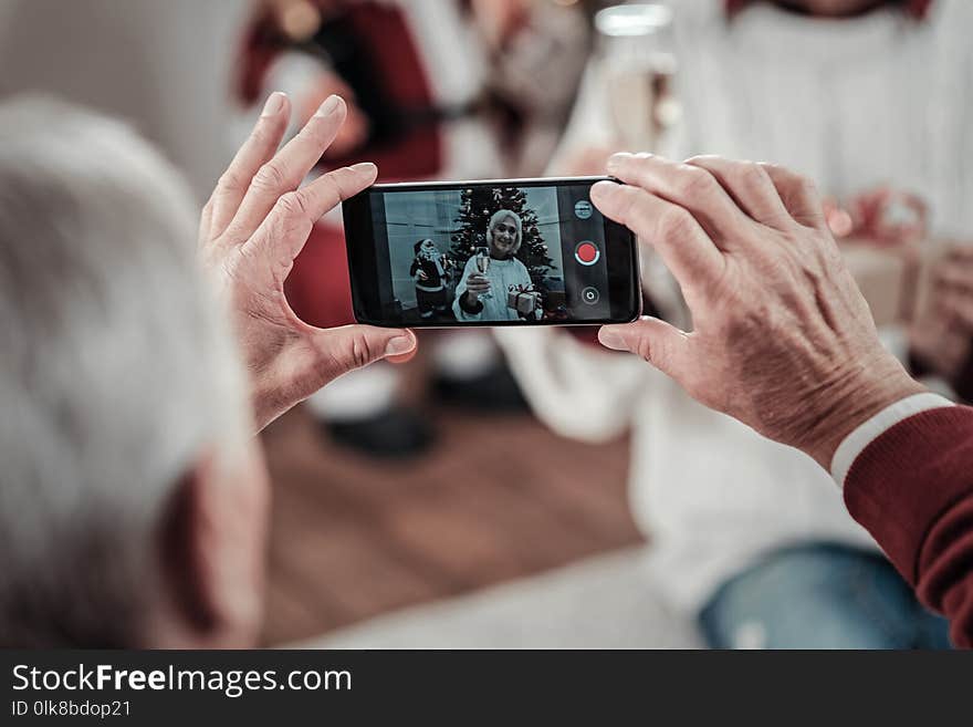 Close Up Of Male Hands That Holding Telephone