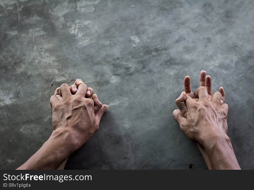 Man`s hand holding a woman hand, sexual abuse and concept