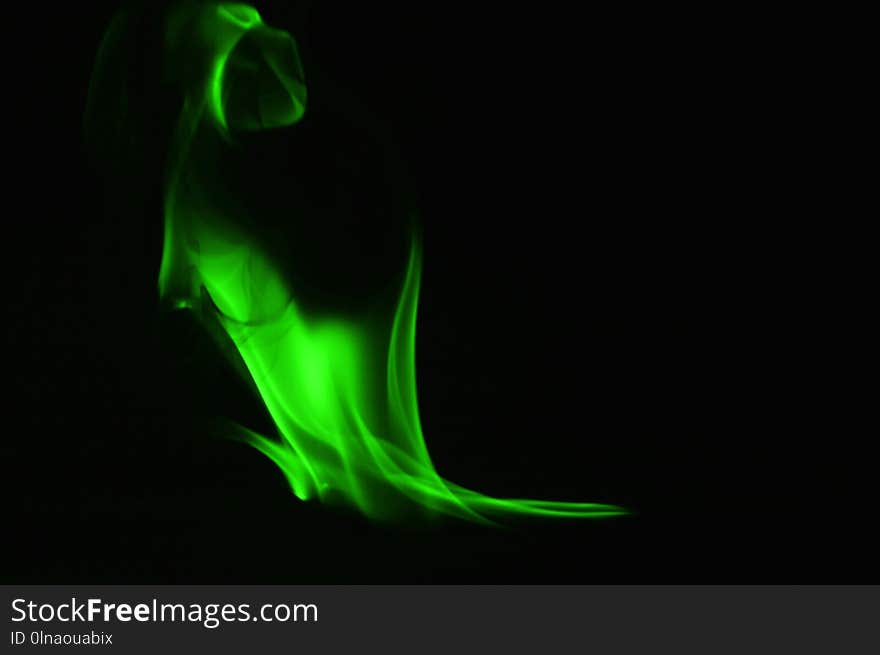 Beautifu Green Fire Flames On A Black Background.