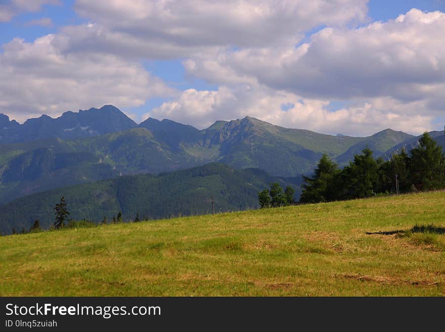 Grassland, Highland, Sky, Mountainous Landforms