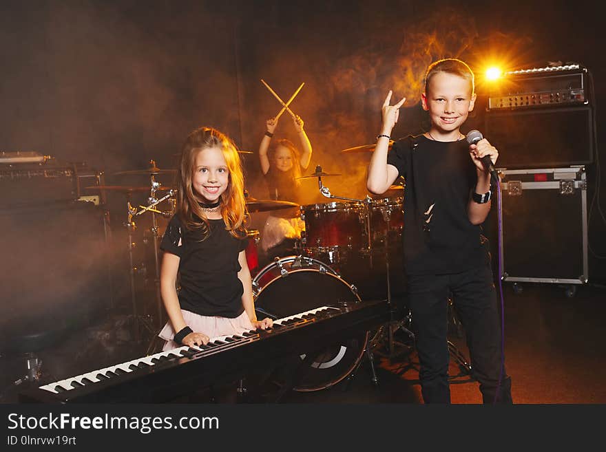 Children Singing And Playing Music