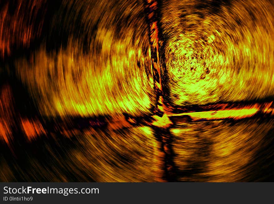 An Abstract Photo Depicting a Tornado with a Crucifix of Fire and Fury Spinning in a Vortex of Flames. An Abstract Photo Depicting a Tornado with a Crucifix of Fire and Fury Spinning in a Vortex of Flames