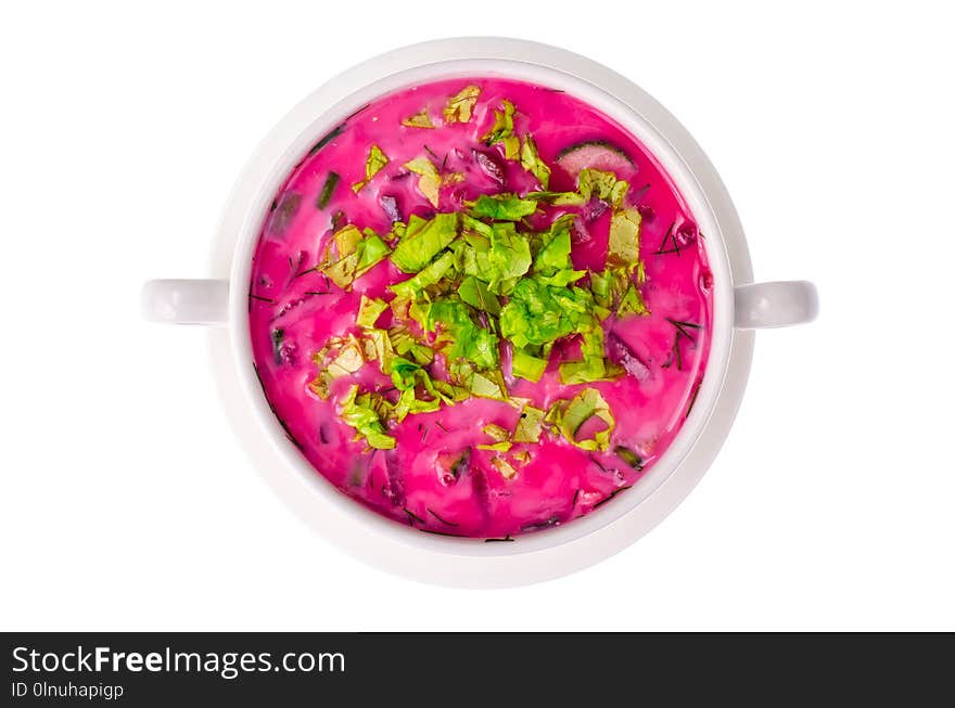 Red beet soup with greens. Studio Photon