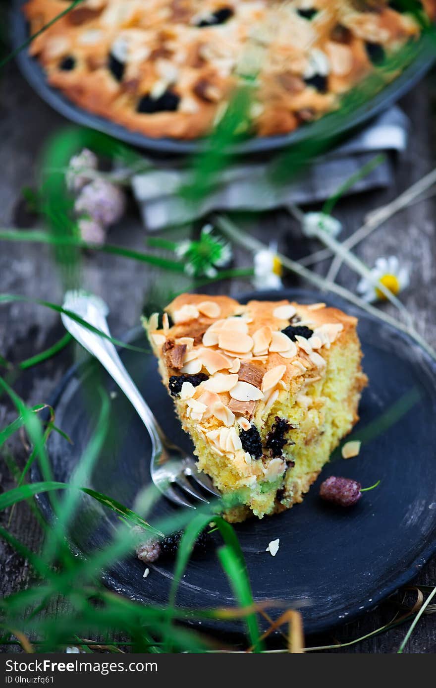 Mulberry white chocolate almond cake.outdoor photo.selective focus