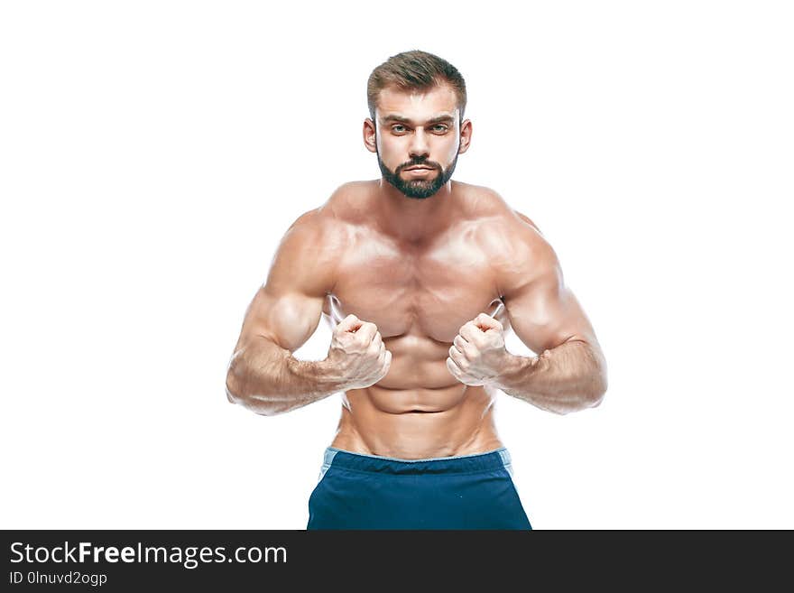 Bodybuilder posing. Beautiful sporty guy male power. Fitness muscled in blue shorts. on isolated white background. Man