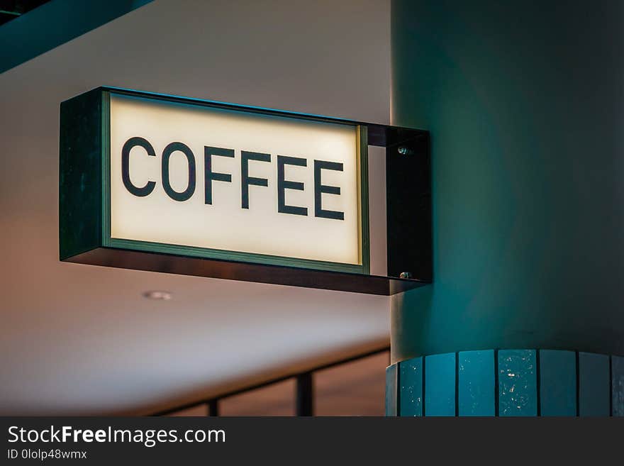 Coffee sign on a coffee shop in the street