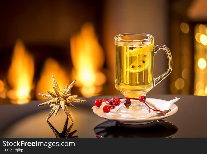 Hot warm spiced vodka martini drink cocktail festive green black wooden table copy space garnish. Hot warm spiced vodka martini drink cocktail festive green black wooden table copy space garnish