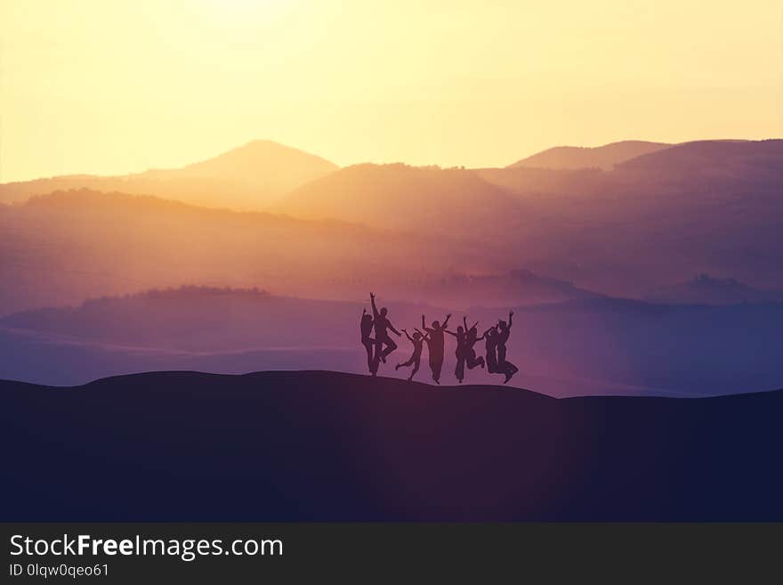 Group of people jumping high on the hill during sunset. Joy and happiness. 3D illustration.