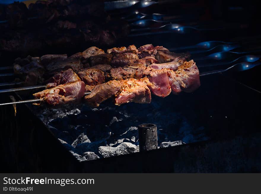 Shish kebab with spices preparing on skewers. Shish kebab with spices preparing on skewers