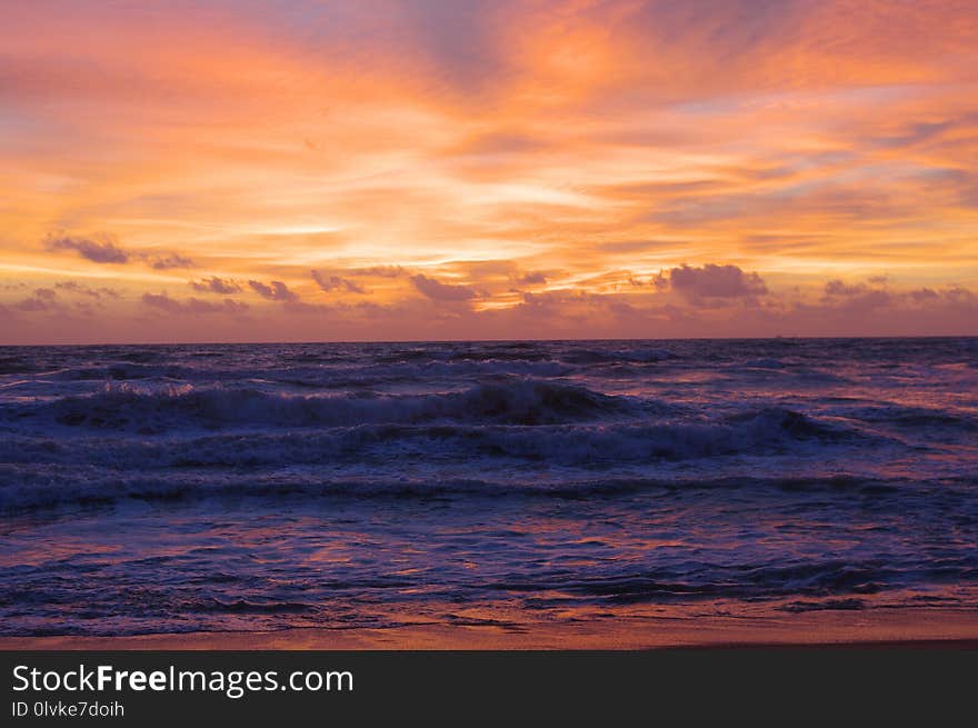 Sunlight At The Ocean With Clouds