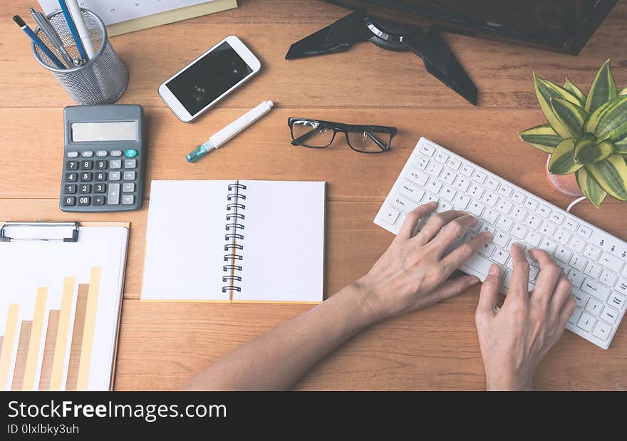 Businessman working and typing on keyboard for business and accounting concept.