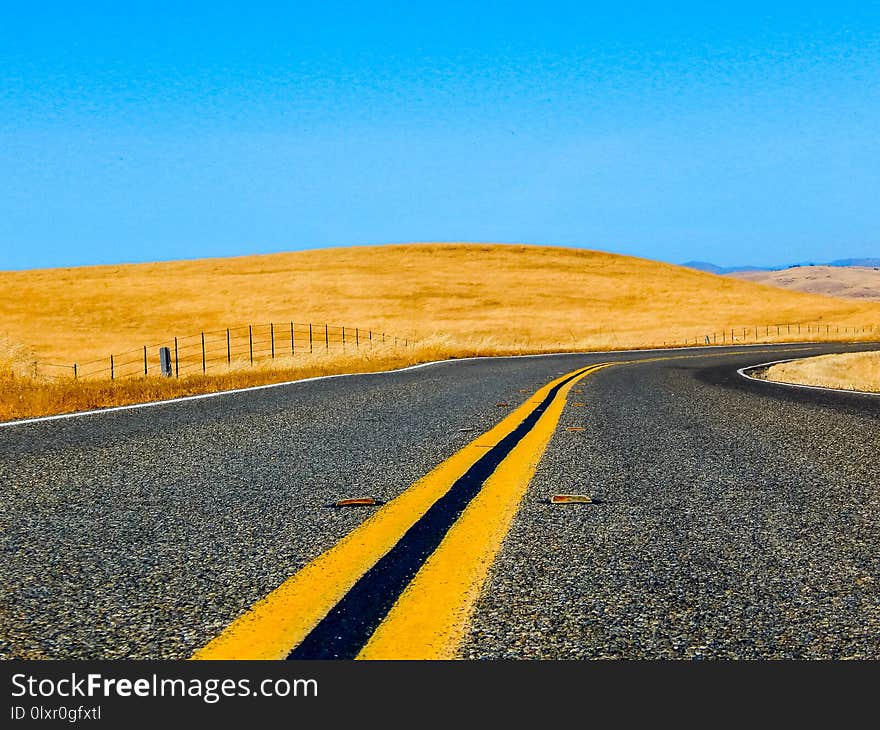 Dry Land and Curvy road in Central California Roads