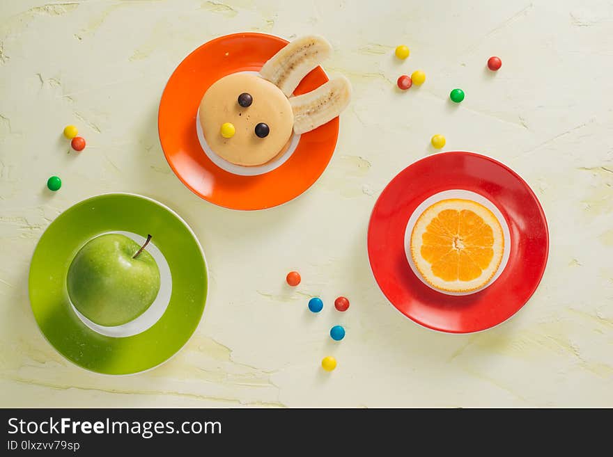 Funny bunny pancakes with fruits for Easter kids breakfast.