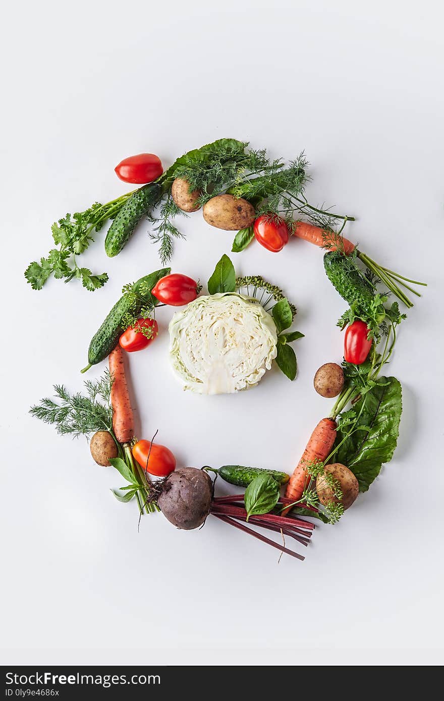 Vegetables on white background, spiral shape. Vegetables on white background, spiral shape