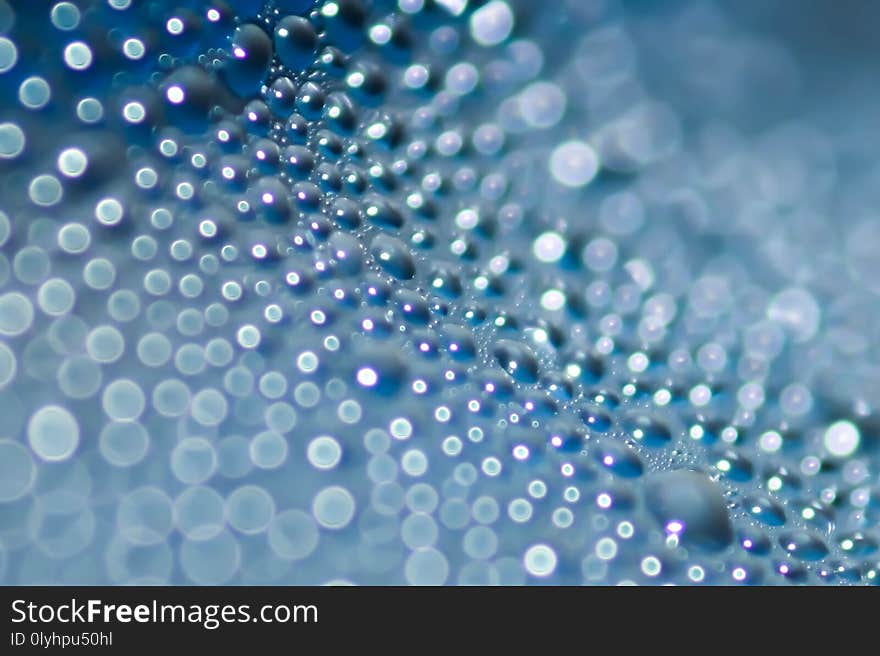 Close up Water drop Condensation with blue blur bokeh