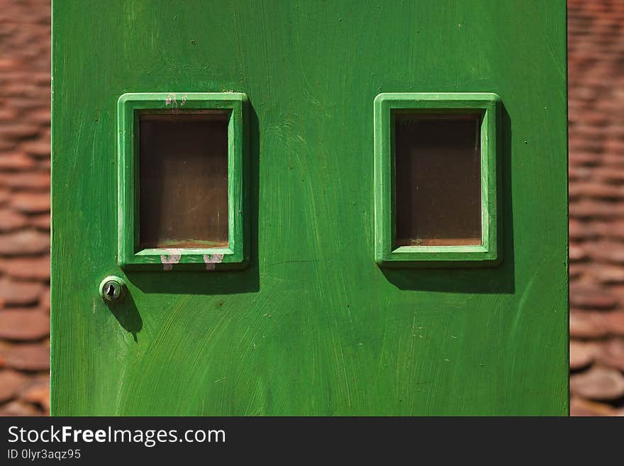 Details of a green electricity meters box, household equipment. Details of a green electricity meters box, household equipment.