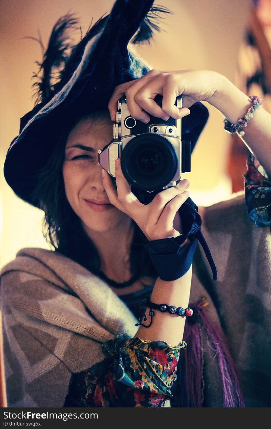 Happy Halloween Woman photographer dressed as witch